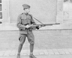 A US soldier in France demonstrates a Browning Automatic Rifle in November 1918.