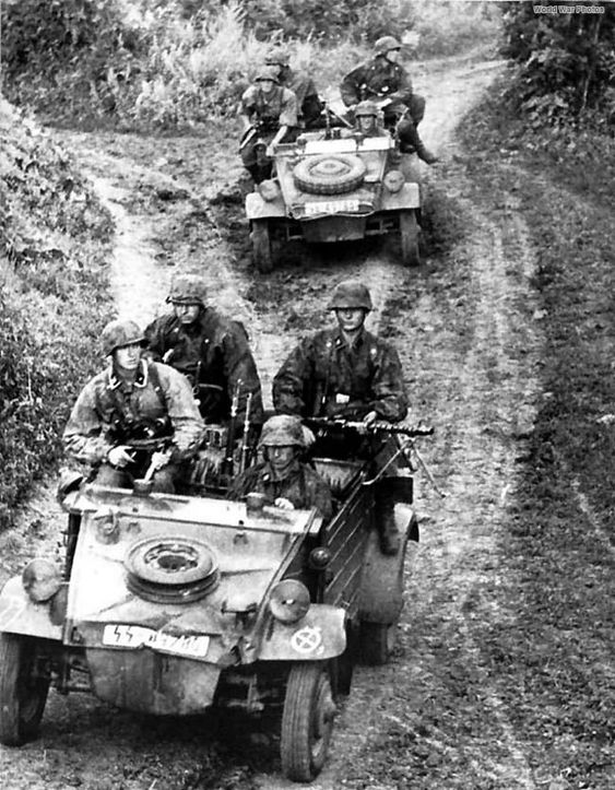 SS troops riding in their VW Type 82 Kubelwagen